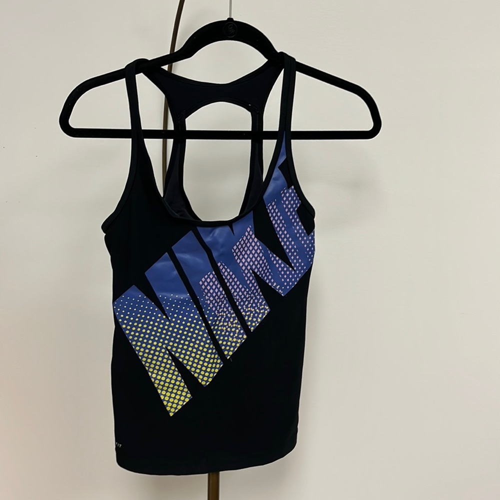 Dri-fit Nike athletic tank with build in shelf bra.